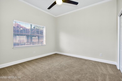 Discover refined luxury in the exclusive gated community of on Jacksonville Golf and Country Club in Florida - for sale on GolfHomes.com, golf home, golf lot