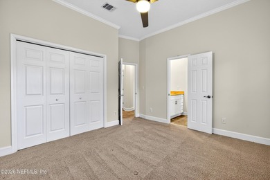 Discover refined luxury in the exclusive gated community of on Jacksonville Golf and Country Club in Florida - for sale on GolfHomes.com, golf home, golf lot