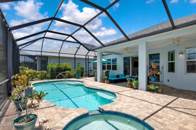 Tropical-inspired Coconut model single-family pool & spa home on LPGA International Golf Course in Florida - for sale on GolfHomes.com, golf home, golf lot