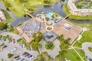 Welcome to this spacious and fully furnished 2-bedroom, 2-bath on Sunrise Lakes Phase III in Florida - for sale on GolfHomes.com, golf home, golf lot