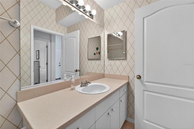 This well-maintained, turn-key property offers a perfect blend on Falcon Watch Golf Club in Florida - for sale on GolfHomes.com, golf home, golf lot
