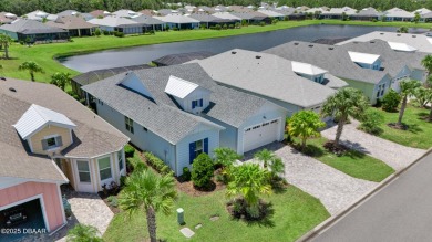 Tropical-inspired Coconut model single-family pool & spa home on LPGA International Golf Course in Florida - for sale on GolfHomes.com, golf home, golf lot