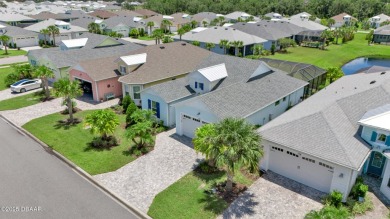 Tropical-inspired Coconut model single-family pool & spa home on LPGA International Golf Course in Florida - for sale on GolfHomes.com, golf home, golf lot