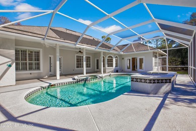 Discover refined luxury in the exclusive gated community of on Jacksonville Golf and Country Club in Florida - for sale on GolfHomes.com, golf home, golf lot