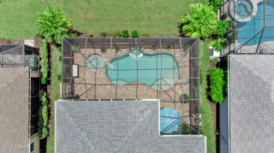 Tropical-inspired Coconut model single-family pool & spa home on LPGA International Golf Course in Florida - for sale on GolfHomes.com, golf home, golf lot