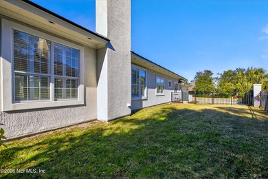 Discover refined luxury in the exclusive gated community of on Jacksonville Golf and Country Club in Florida - for sale on GolfHomes.com, golf home, golf lot