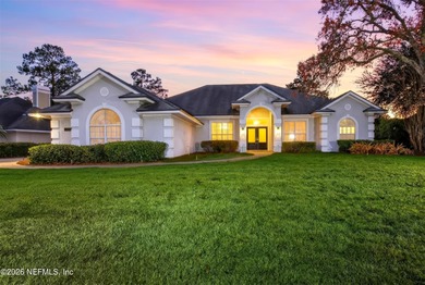 Discover refined luxury in the exclusive gated community of on Jacksonville Golf and Country Club in Florida - for sale on GolfHomes.com, golf home, golf lot