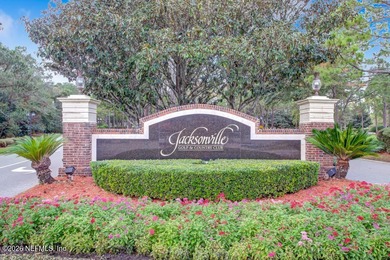 Discover refined luxury in the exclusive gated community of on Jacksonville Golf and Country Club in Florida - for sale on GolfHomes.com, golf home, golf lot