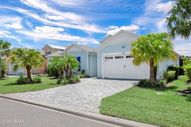 Tropical-inspired Coconut model single-family pool & spa home on LPGA International Golf Course in Florida - for sale on GolfHomes.com, golf home, golf lot