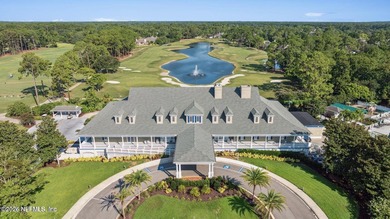 Discover refined luxury in the exclusive gated community of on Jacksonville Golf and Country Club in Florida - for sale on GolfHomes.com, golf home, golf lot
