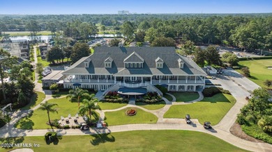 Discover refined luxury in the exclusive gated community of on Jacksonville Golf and Country Club in Florida - for sale on GolfHomes.com, golf home, golf lot