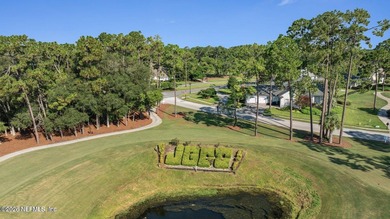 Discover refined luxury in the exclusive gated community of on Jacksonville Golf and Country Club in Florida - for sale on GolfHomes.com, golf home, golf lot