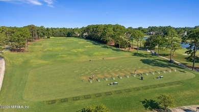 Discover refined luxury in the exclusive gated community of on Jacksonville Golf and Country Club in Florida - for sale on GolfHomes.com, golf home, golf lot