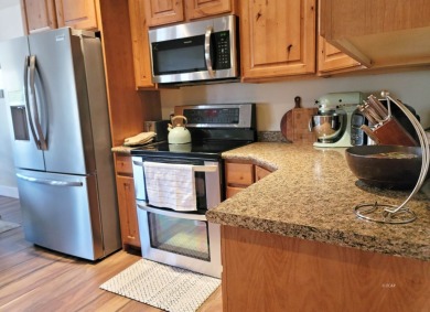 Live where comfort meets golf course views! This 4-bedroom on Toana Vista Golf Course in Nevada - for sale on GolfHomes.com, golf home, golf lot