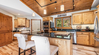 Gorgeous 3 bedroom, 3.5 bath contemporary ranch with rustic on Eagle Ridge Inn and Resort in Illinois - for sale on GolfHomes.com, golf home, golf lot