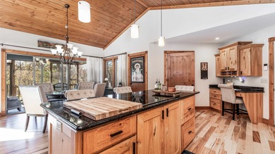 Gorgeous 3 bedroom, 3.5 bath contemporary ranch with rustic on Eagle Ridge Inn and Resort in Illinois - for sale on GolfHomes.com, golf home, golf lot