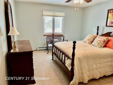 Welcome to this beautifully updated 2-bedroom, 2-bath condo with on Swan Valley Golf Club in Michigan - for sale on GolfHomes.com, golf home, golf lot