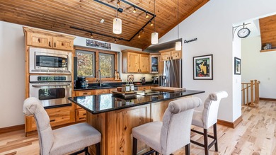 Gorgeous 3 bedroom, 3.5 bath contemporary ranch with rustic on Eagle Ridge Inn and Resort in Illinois - for sale on GolfHomes.com, golf home, golf lot