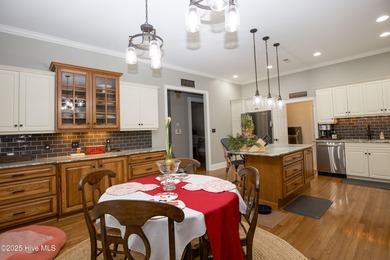 Nestled 8 miles from Pinehurst Resort and 13 miles from downtown on Foxfire Golf and Country Club in North Carolina - for sale on GolfHomes.com, golf home, golf lot