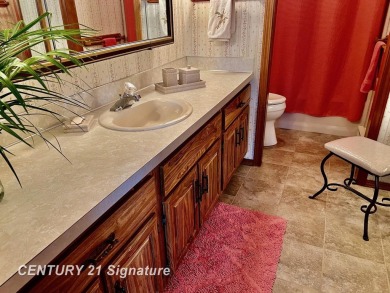 Welcome to this beautifully updated 2-bedroom, 2-bath condo with on Swan Valley Golf Club in Michigan - for sale on GolfHomes.com, golf home, golf lot