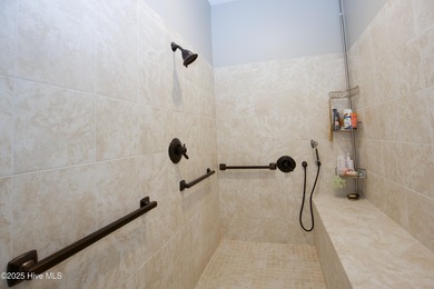 Nestled 8 miles from Pinehurst Resort and 13 miles from downtown on Foxfire Golf and Country Club in North Carolina - for sale on GolfHomes.com, golf home, golf lot