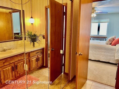 Welcome to this beautifully updated 2-bedroom, 2-bath condo with on Swan Valley Golf Club in Michigan - for sale on GolfHomes.com, golf home, golf lot