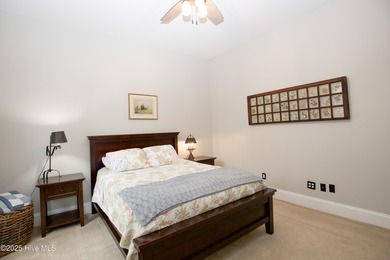 Nestled 8 miles from Pinehurst Resort and 13 miles from downtown on Foxfire Golf and Country Club in North Carolina - for sale on GolfHomes.com, golf home, golf lot