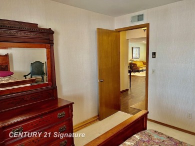 Welcome to this beautifully updated 2-bedroom, 2-bath condo with on Swan Valley Golf Club in Michigan - for sale on GolfHomes.com, golf home, golf lot