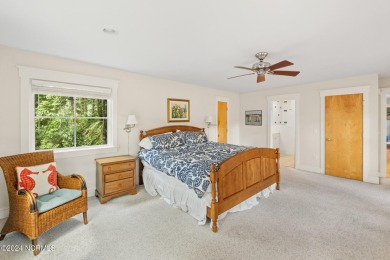 This 4BR, 3.5BA reverse floorplan tucked among mature oaks has on Bald Head Island Golf Club in North Carolina - for sale on GolfHomes.com, golf home, golf lot