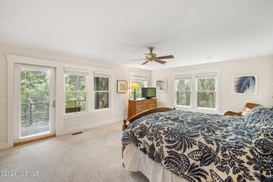 This 4BR, 3.5BA reverse floorplan tucked among mature oaks has on Bald Head Island Golf Club in North Carolina - for sale on GolfHomes.com, golf home, golf lot