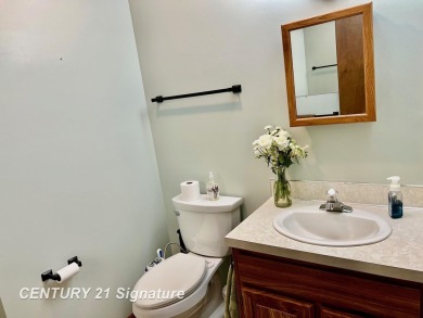 Welcome to this beautifully updated 2-bedroom, 2-bath condo with on Swan Valley Golf Club in Michigan - for sale on GolfHomes.com, golf home, golf lot