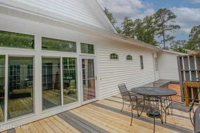 Nestled 8 miles from Pinehurst Resort and 13 miles from downtown on Foxfire Golf and Country Club in North Carolina - for sale on GolfHomes.com, golf home, golf lot