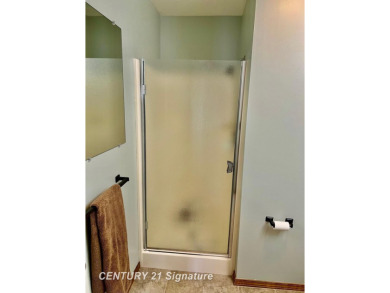 Welcome to this beautifully updated 2-bedroom, 2-bath condo with on Swan Valley Golf Club in Michigan - for sale on GolfHomes.com, golf home, golf lot