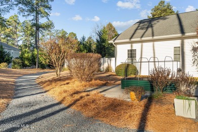 Nestled 8 miles from Pinehurst Resort and 13 miles from downtown on Foxfire Golf and Country Club in North Carolina - for sale on GolfHomes.com, golf home, golf lot