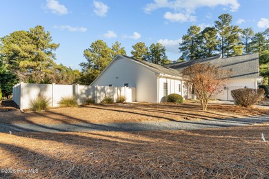 Nestled 8 miles from Pinehurst Resort and 13 miles from downtown on Foxfire Golf and Country Club in North Carolina - for sale on GolfHomes.com, golf home, golf lot