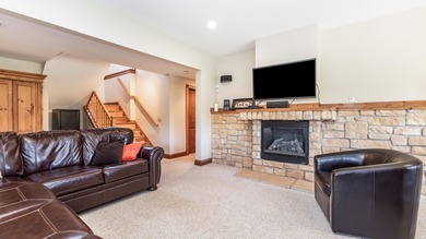 Gorgeous 3 bedroom, 3.5 bath contemporary ranch with rustic on Eagle Ridge Inn and Resort in Illinois - for sale on GolfHomes.com, golf home, golf lot