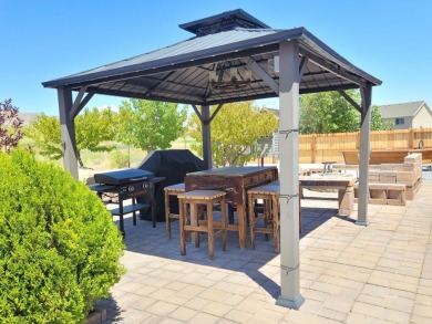 Live where comfort meets golf course views! This 4-bedroom on Toana Vista Golf Course in Nevada - for sale on GolfHomes.com, golf home, golf lot
