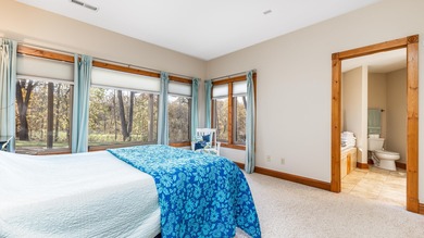 Gorgeous 3 bedroom, 3.5 bath contemporary ranch with rustic on Eagle Ridge Inn and Resort in Illinois - for sale on GolfHomes.com, golf home, golf lot