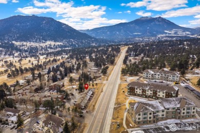 Escape to the perfect blend of comfort and convenience in this on Estes Park Golf Course in Colorado - for sale on GolfHomes.com, golf home, golf lot