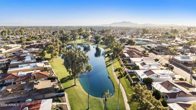 Expanded, immaculately maintained 2BR, 2BA Shawnee model on a on Cottonwood Country Club in Arizona - for sale on GolfHomes.com, golf home, golf lot