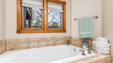 Gorgeous 3 bedroom, 3.5 bath contemporary ranch with rustic on Eagle Ridge Inn and Resort in Illinois - for sale on GolfHomes.com, golf home, golf lot