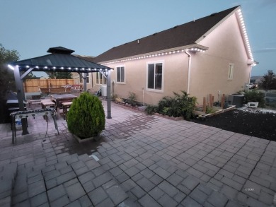 Live where comfort meets golf course views! This 4-bedroom on Toana Vista Golf Course in Nevada - for sale on GolfHomes.com, golf home, golf lot