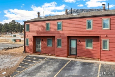 Escape to the perfect blend of comfort and convenience in this on Estes Park Golf Course in Colorado - for sale on GolfHomes.com, golf home, golf lot