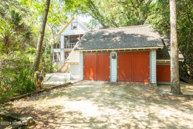 This 4BR, 3.5BA reverse floorplan tucked among mature oaks has on Bald Head Island Golf Club in North Carolina - for sale on GolfHomes.com, golf home, golf lot