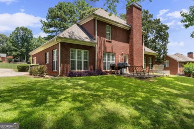 Welcome to this stately 4 bedroom, 2.5 bathroom traditional on Canongate At Georgia National Golf Club in Georgia - for sale on GolfHomes.com, golf home, golf lot