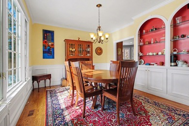 Nestled on a private, wooded half-acre cul-de-sac in the on Polo Fields Golf and Country Club in Michigan - for sale on GolfHomes.com, golf home, golf lot