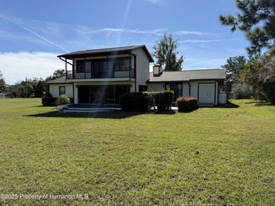 Unique 4-Bedroom Home on the Golf Course Of Ridge Manor Country on The Ridge Manor Oaks Golf and Country Club in Florida - for sale on GolfHomes.com, golf home, golf lot