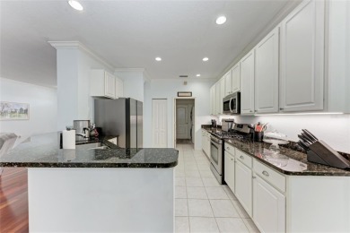 Charming home with heated pool in Riverwalk Village, Lakewood on The River Club in Florida - for sale on GolfHomes.com, golf home, golf lot