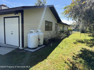 Unique 4-Bedroom Home on the Golf Course Of Ridge Manor Country on The Ridge Manor Oaks Golf and Country Club in Florida - for sale on GolfHomes.com, golf home, golf lot
