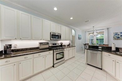 Charming home with heated pool in Riverwalk Village, Lakewood on The River Club in Florida - for sale on GolfHomes.com, golf home, golf lot